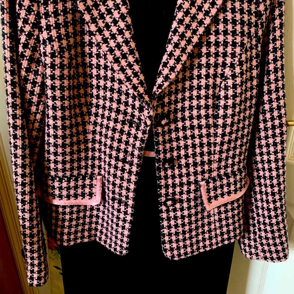 Pink and black houndstooth power dress suit.